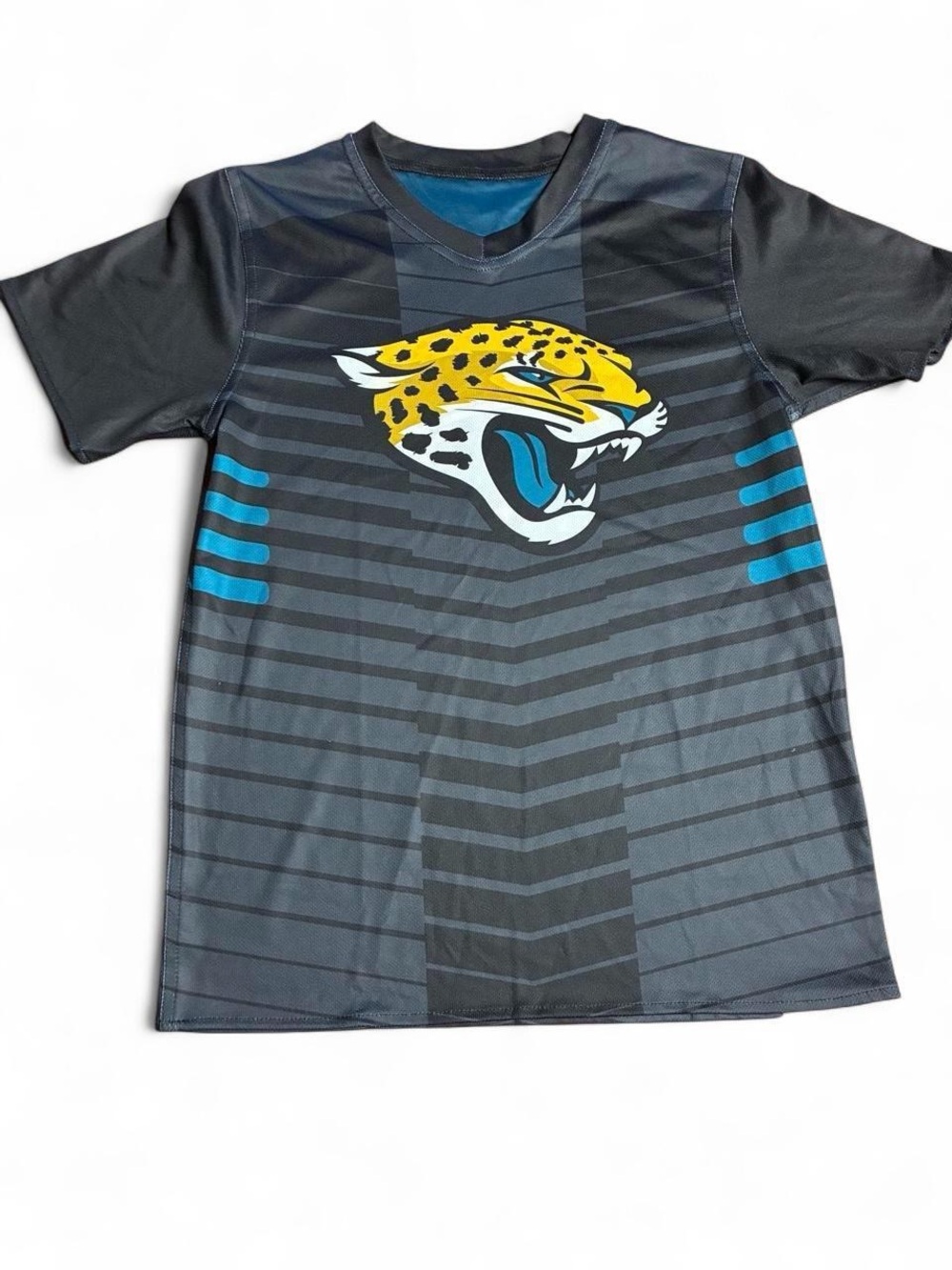 Jacksonville Jaguars NFL Youth L 10/12 Graphic Football Shirt Black Teal Gold